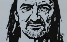 Portret mężczyzny w długich włosach.