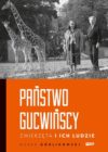 okładka książki, kobieta i mężczyzna oraz dwie żyrafy w tle drzewa, w połowie okładki duży napis: Państwo Gucwińscy zwierzęta i ich ludzie Marek Górlikowski