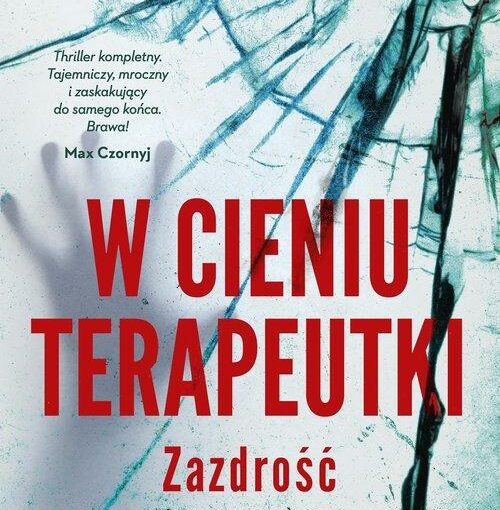 Okładka książki, rozbita szyba z kroplami wody, w połowie napis: W cieniu terapeutki, zazdrość, Anna Krystaszek